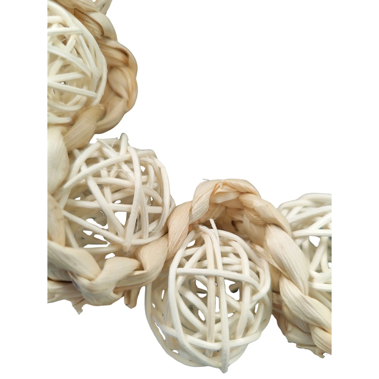 close up of the natural cane ball ring bird toy