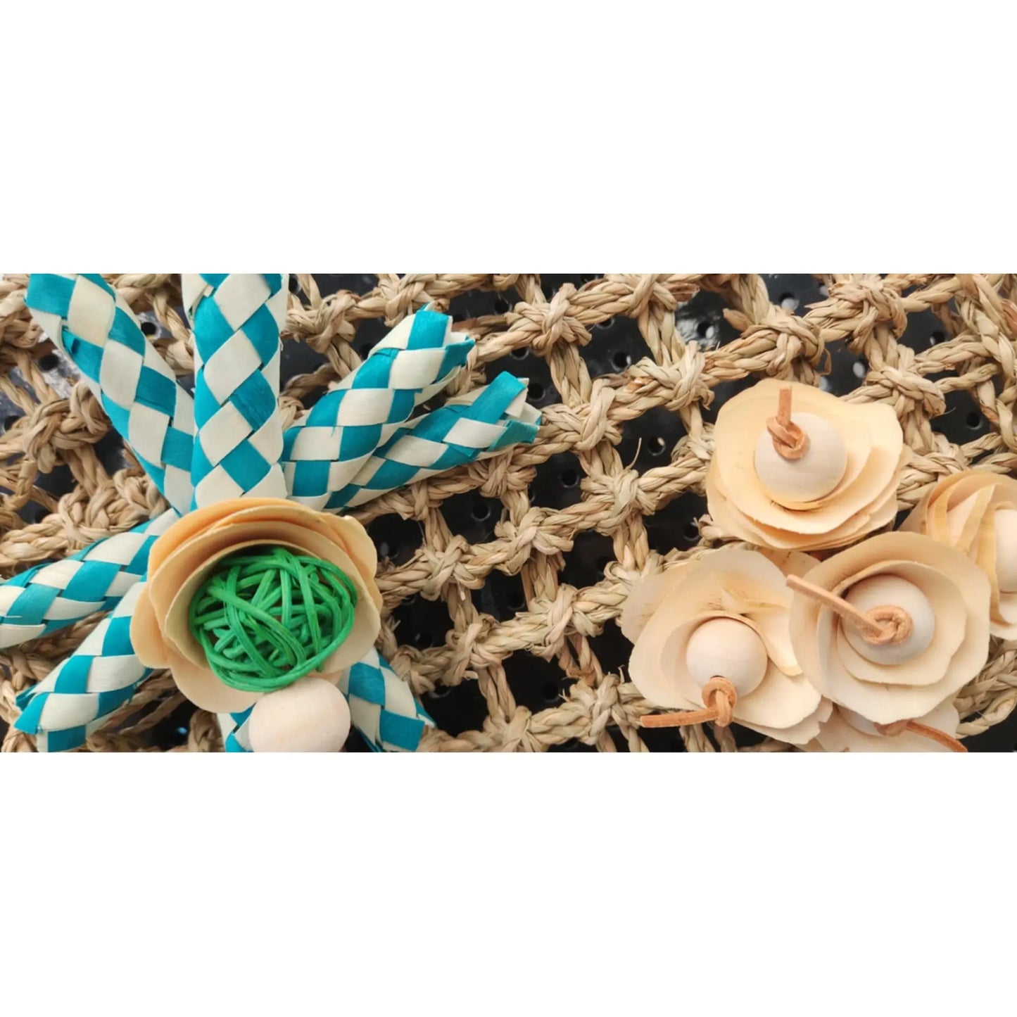 close up of the finger trap flower mat bird toy