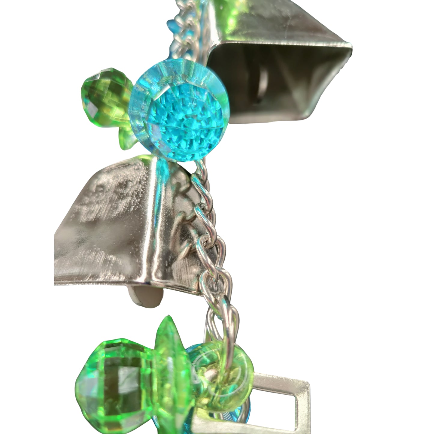 close up of the large cow bell with bling bird toy