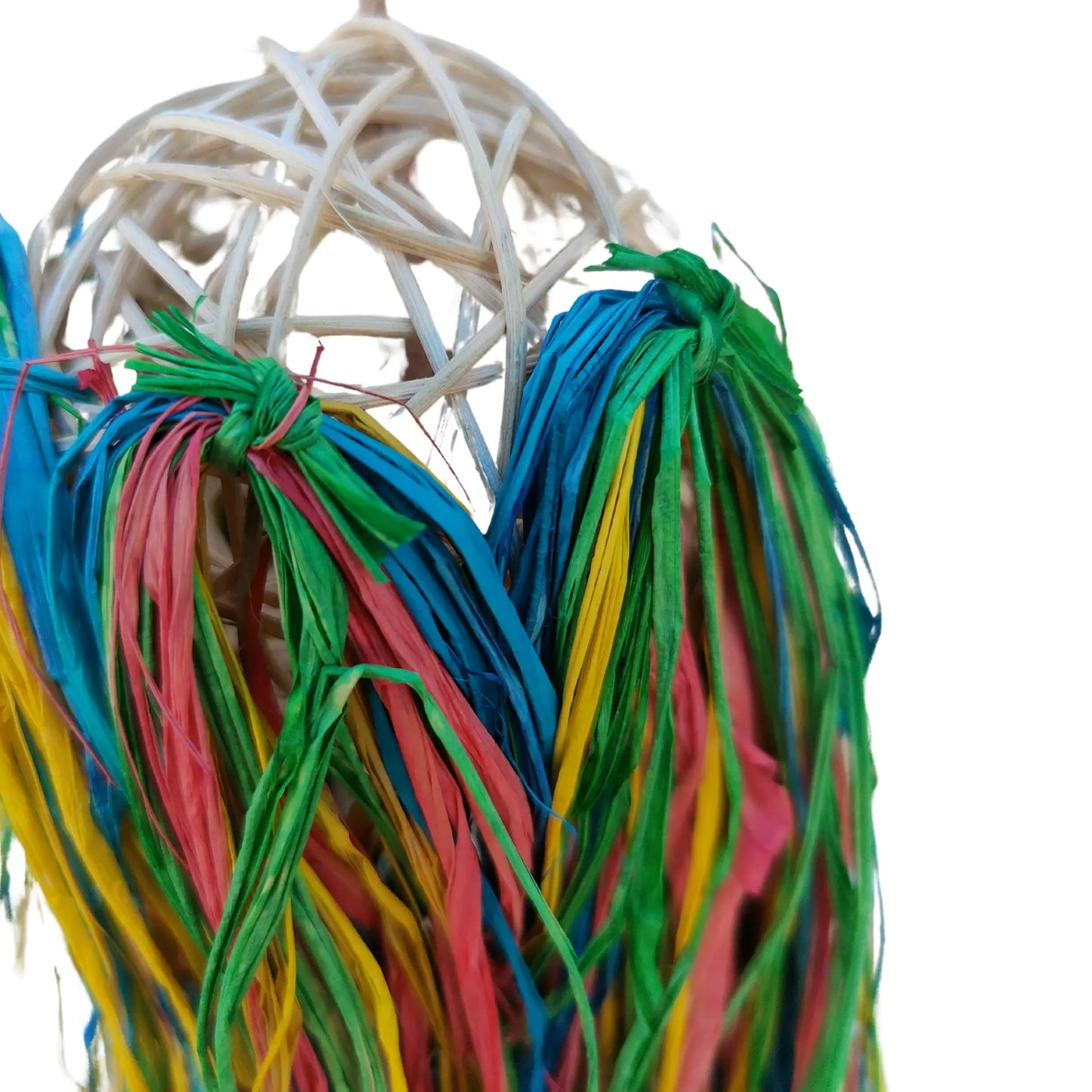 close up of large shaggy cane ball bird toy