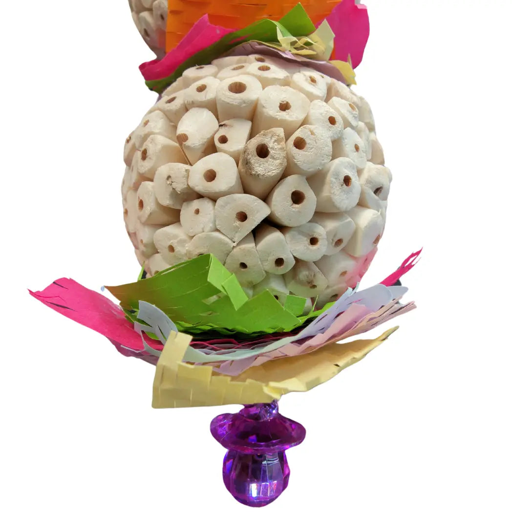 close up of large twin sola balls bird toys