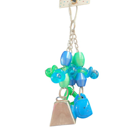 beads, dummies, mini mug cup, cow bell put together to create fun bird toy