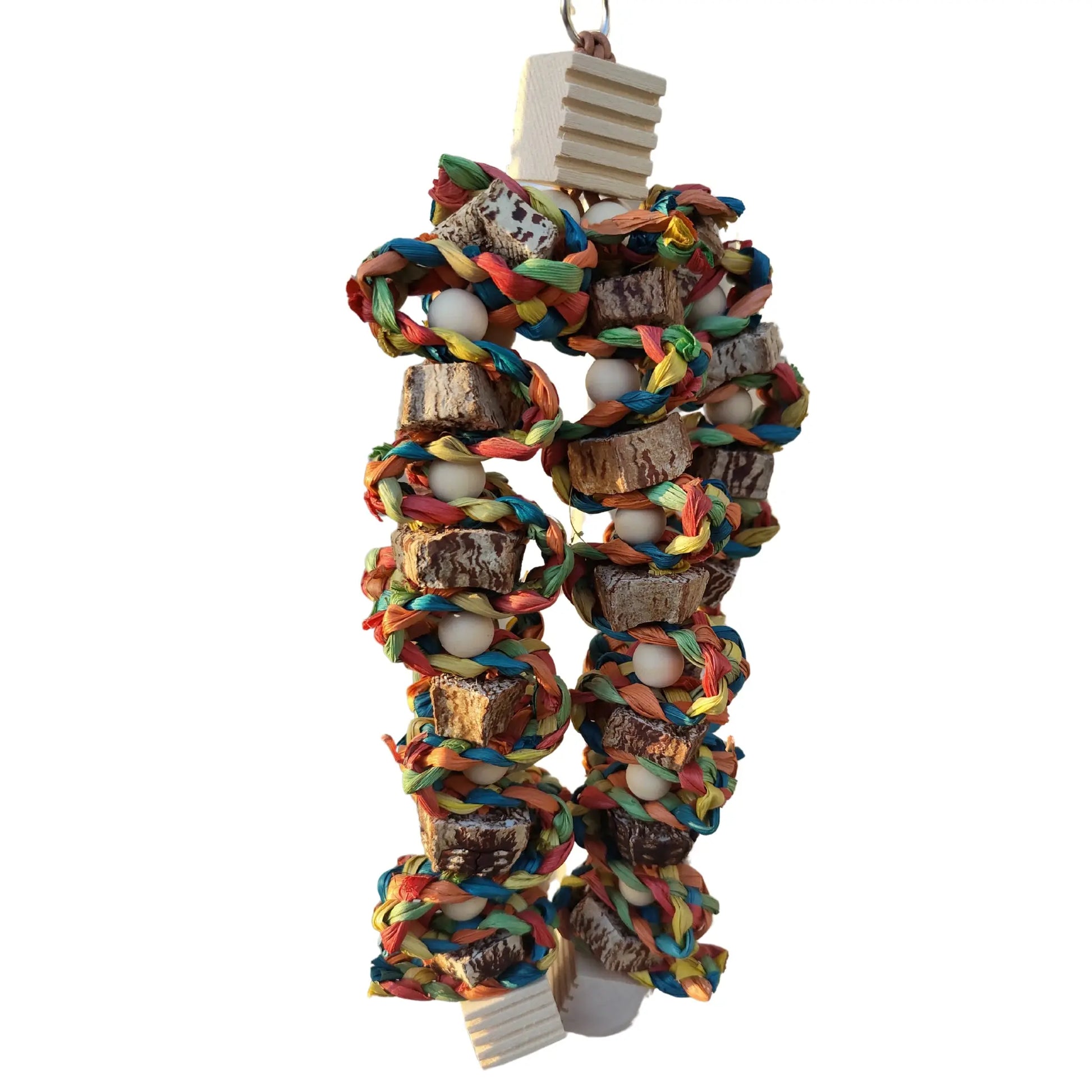 mahogony pods and cane weave weaved around the pods to make this bird toy