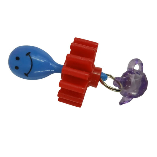 Maraca, plastic gear and a tea pot bead make this foot bird toy