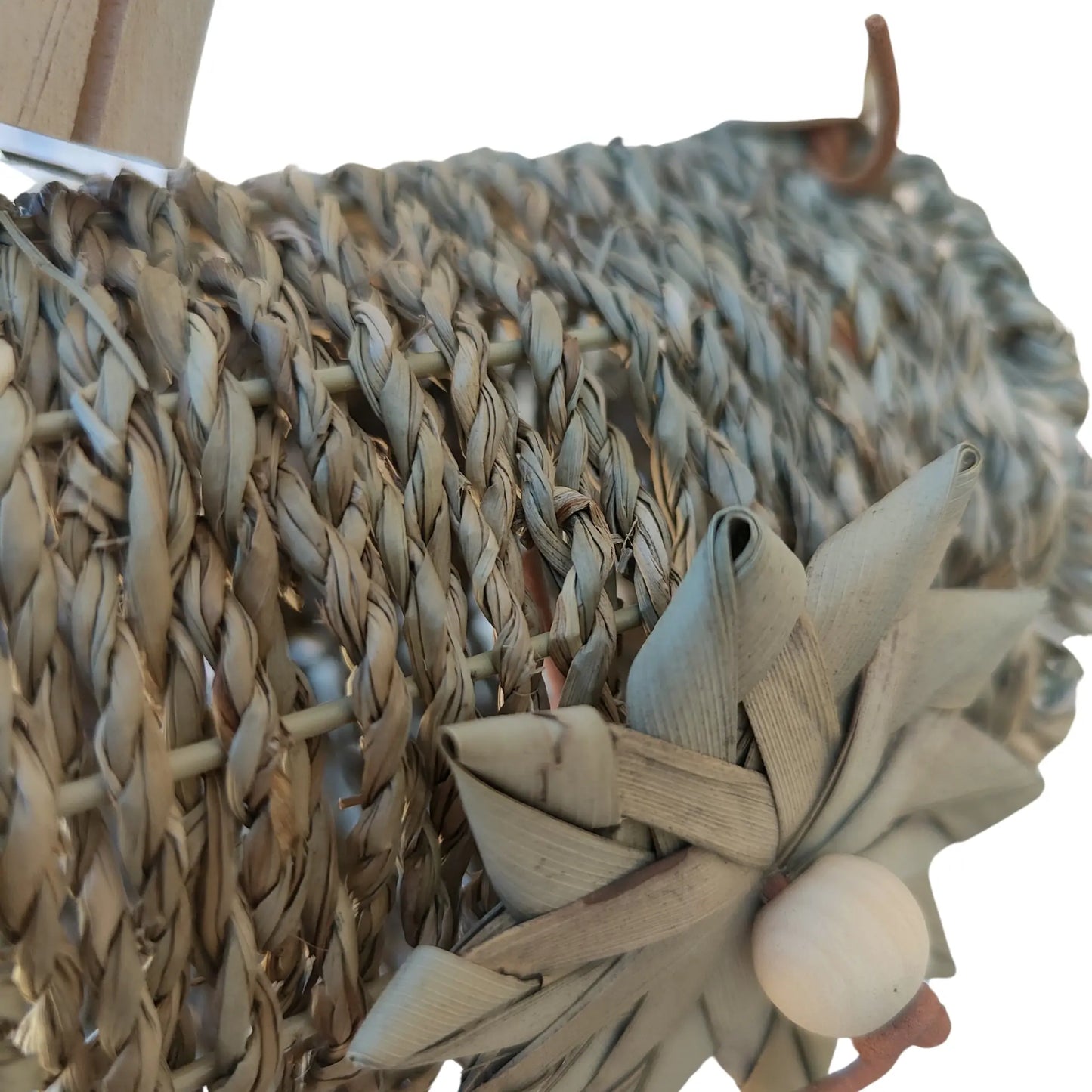 close up of mini natural tunnel bird toy