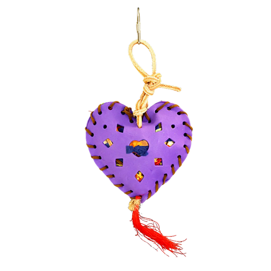 Eva heart filled with blocks and shredded paper. Our Sun conure loves pulling this bird toy to pieces and playing with all the bits that come out.