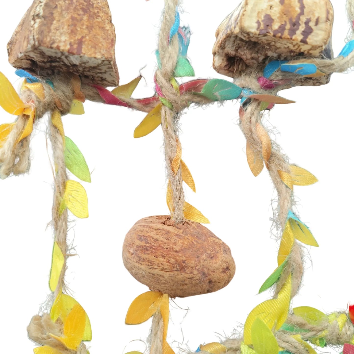 close up of perches with hanging net bird toy