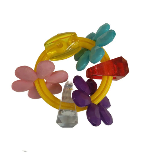 ring of fun foot bird toy has flower beads, bead and chunky ring all on a large plastic link