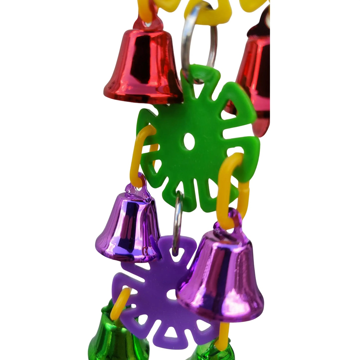 close up of the lou lou bells hand made bird toy small discs and bells