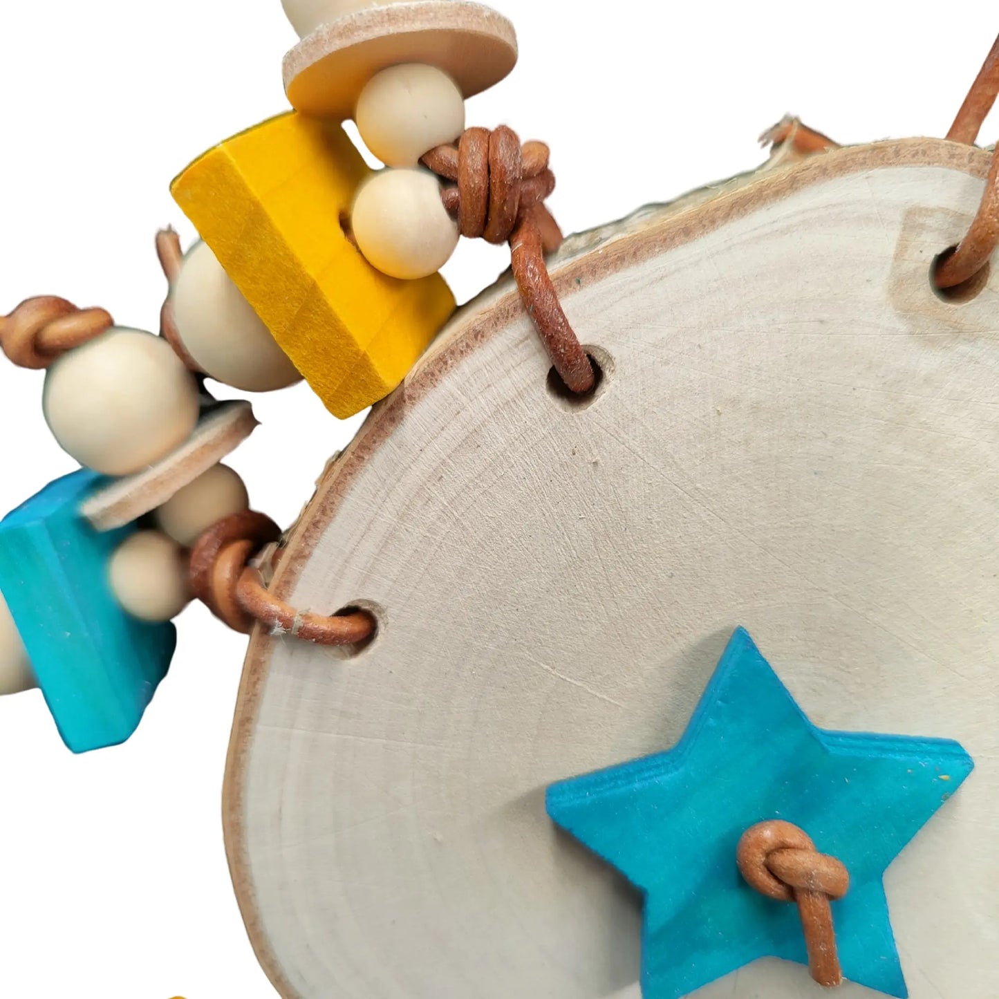 close up of star slice bird toy