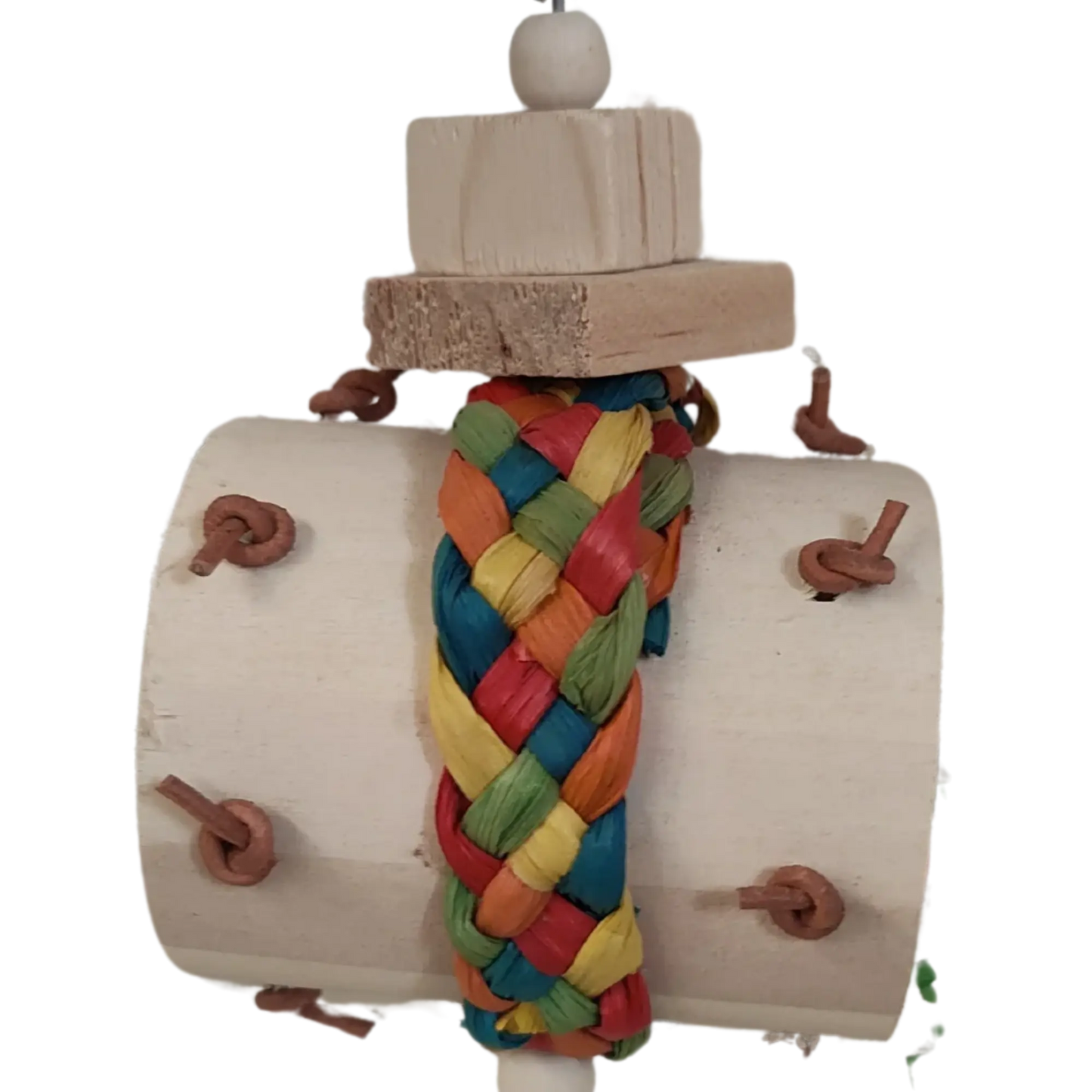 Closeup Wood barrel, coloured palm leaf weave strap, wood blocks, metal chain all joined together with a bell on the bottom. Natural tough but wreckable. Suitable for medium size birds.