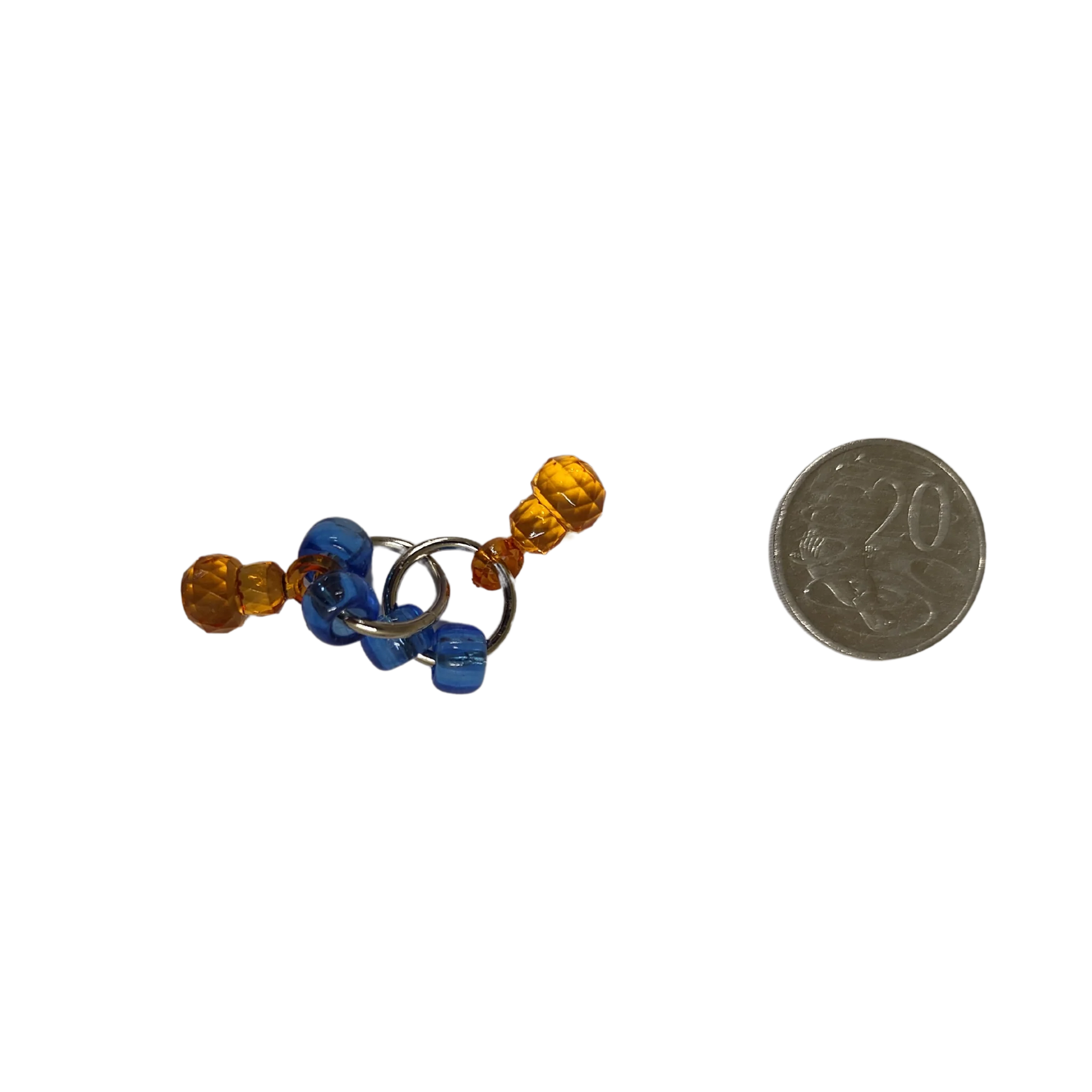 two diamond dummies linked together by orings foot toy