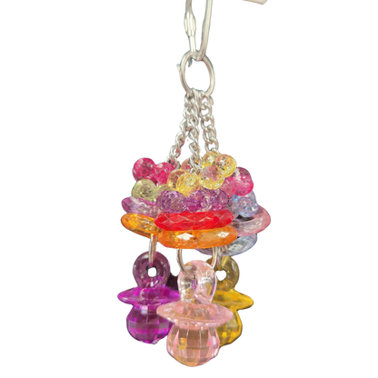  close up of three chains of bling bird toy