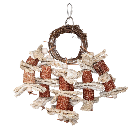 The Shreddable Cane Ring &amp; Corn Husk Bird Toy is designed to satisfy your bird’s natural urge to chew, shred, and explore. Made with a durable cane ring, natural corn husks, and palm weave pieces, this toy provides endless entertainment and foraging fun. With a quick link for easy cage attachment, it’s the perfect addition to your bird’s play area!