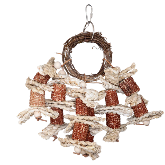 The Shreddable Cane Ring &amp; Corn Husk Bird Toy is designed to satisfy your bird’s natural urge to chew, shred, and explore. Made with a durable cane ring, natural corn husks, and palm weave pieces, this toy provides endless entertainment and foraging fun. With a quick link for easy cage attachment, it’s the perfect addition to your bird’s play area!