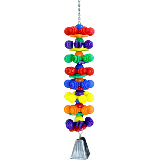 gears, large acrylic balls, large plastic shapes hanging on a chain with a large cow bell at the bottom