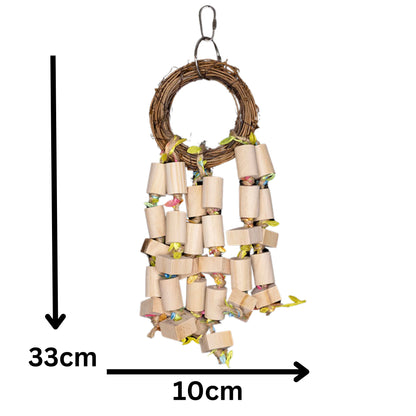 Measurements: Cane Ring with Wooden Blocks Bird Toy. A natural cane ring loaded with hanging wooden blocks, perfect for chewing and play. Ideal for medium-sized birds. Size: 10 cm x 33 cm