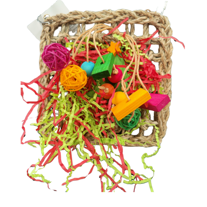 Mat with shredded paper and wood bits bird toy