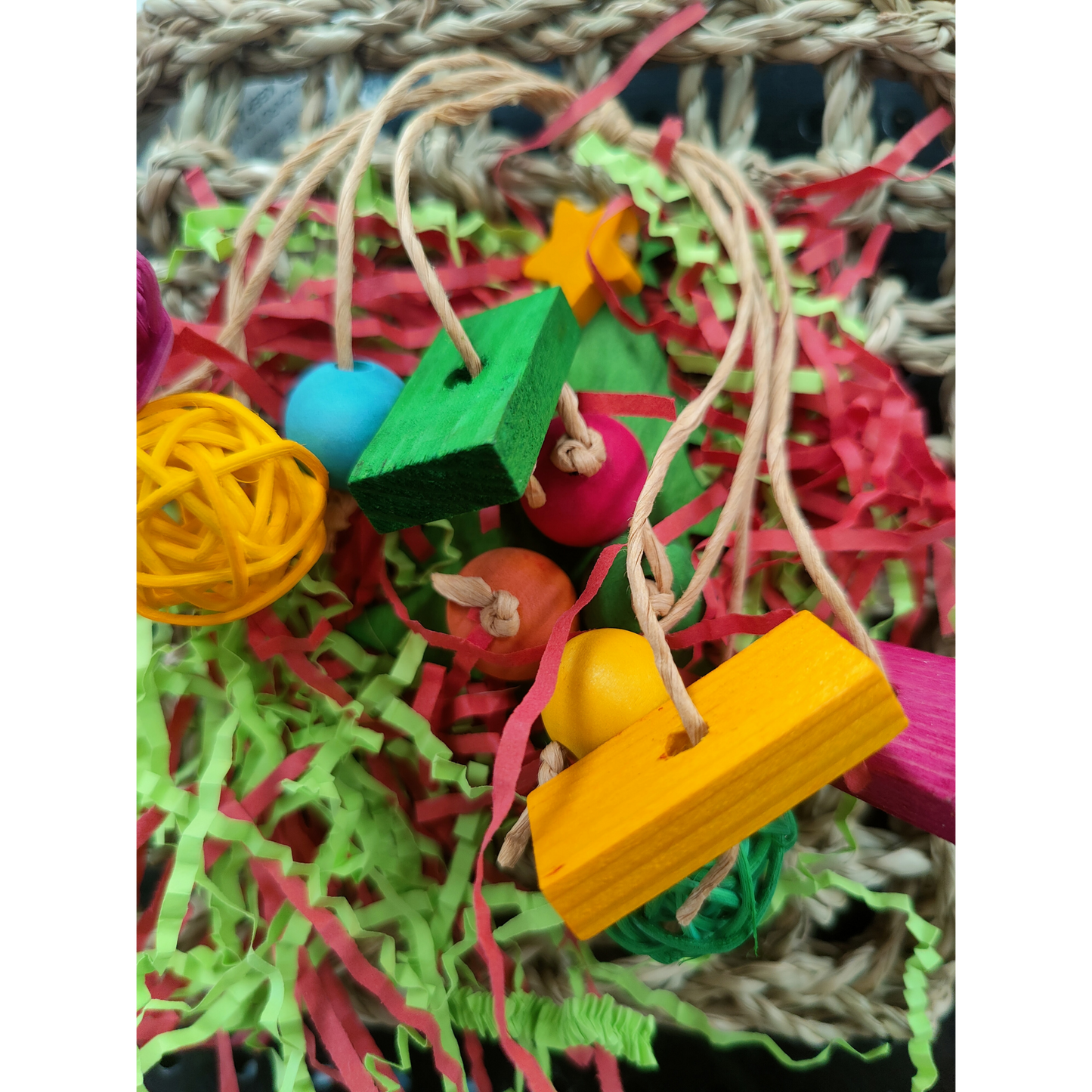 close up of the cherry mat bird toy