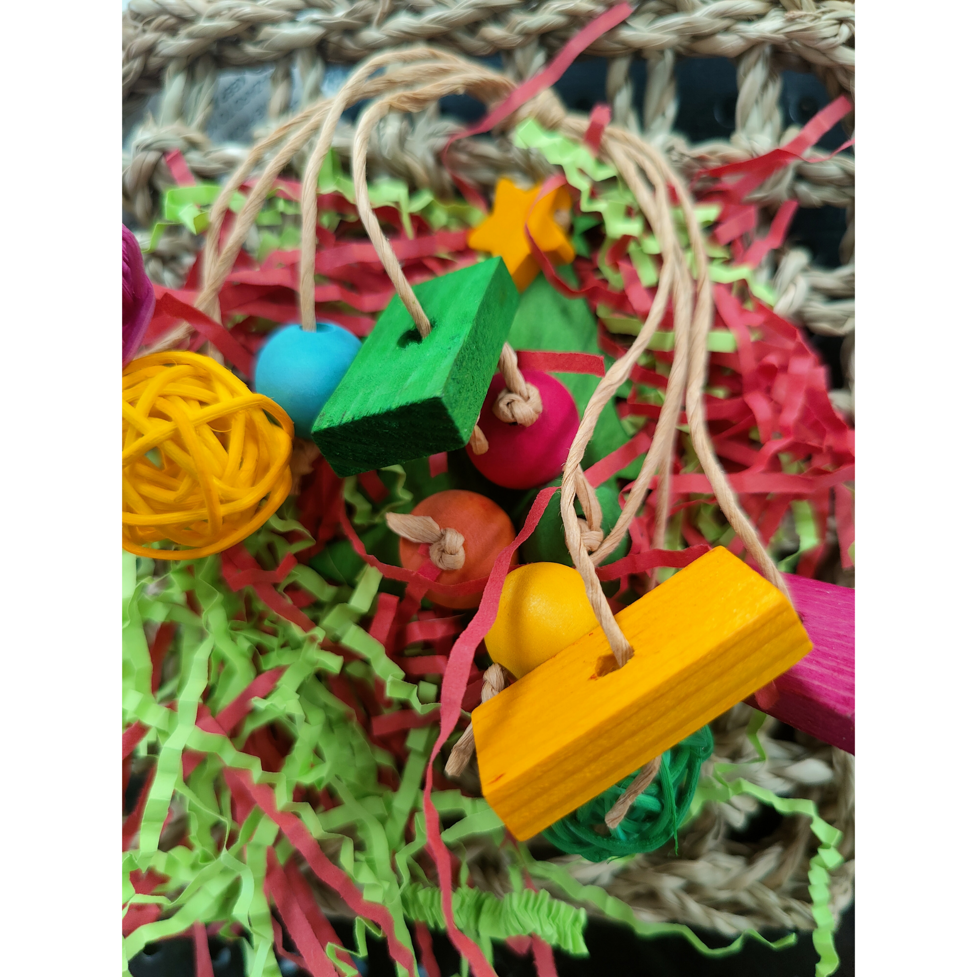 close up of the cherry mat bird toy