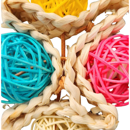 close up of four cane balls bird toy