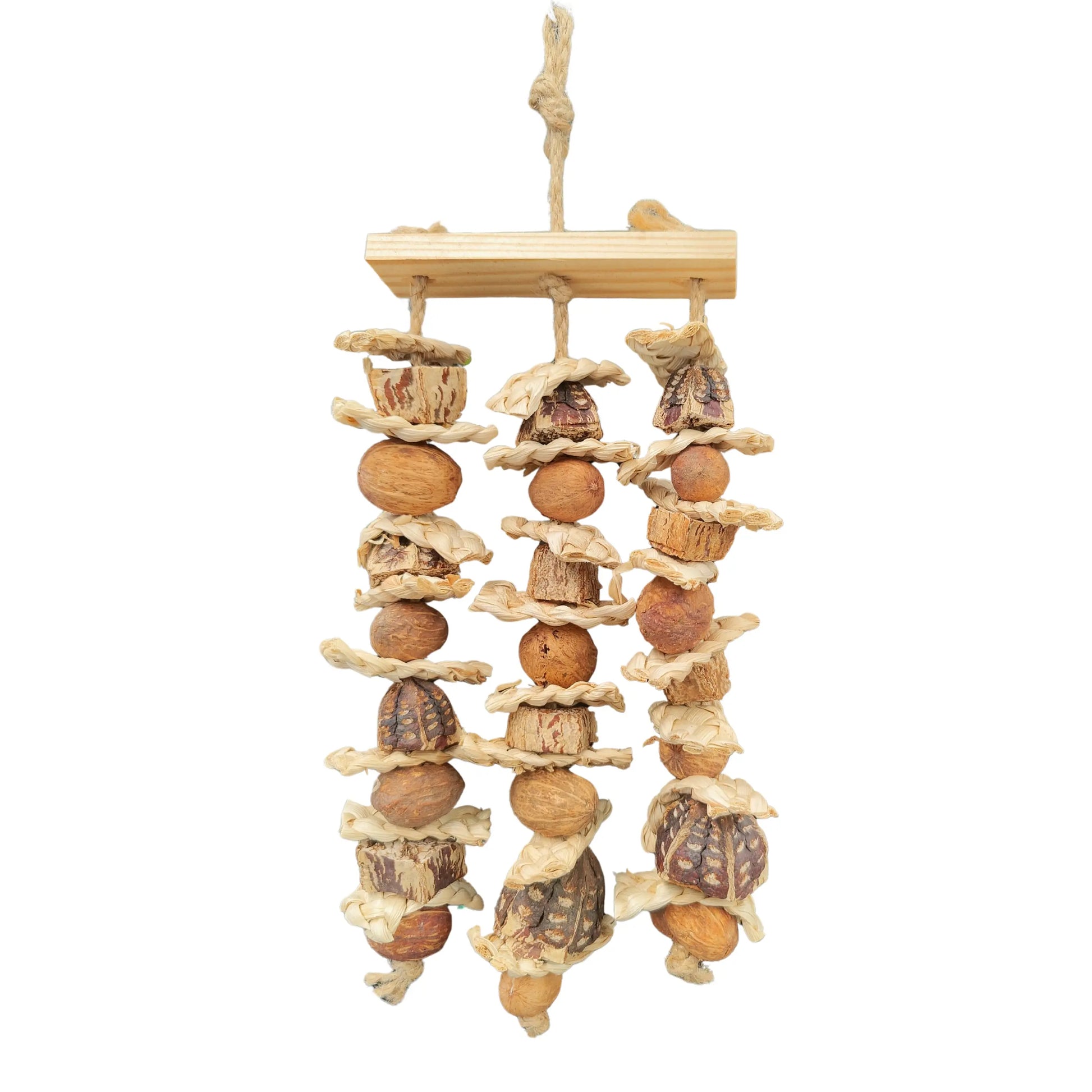 Bird toy made of natural materials like mahogony pieces and nuts