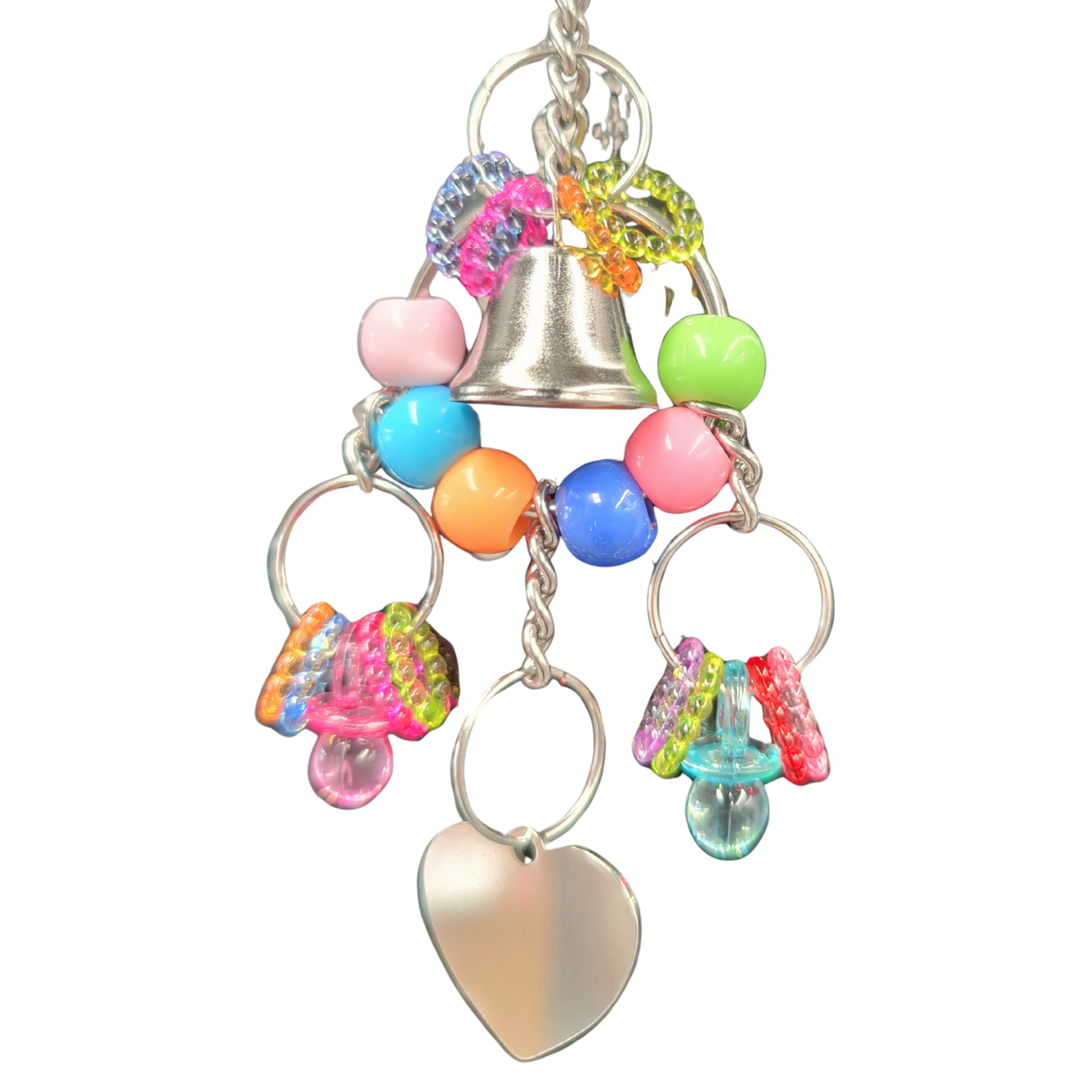 close up of the hanging metal heart bird toy by lou lou bells bird toys