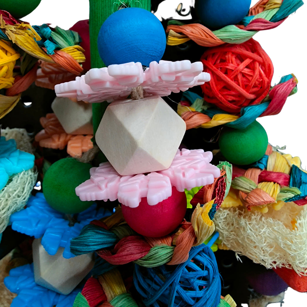 close up hanging snowflakes and beads bird toy