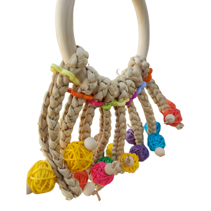close up of ring with cane balls Lou Lou Bells Bird Toy