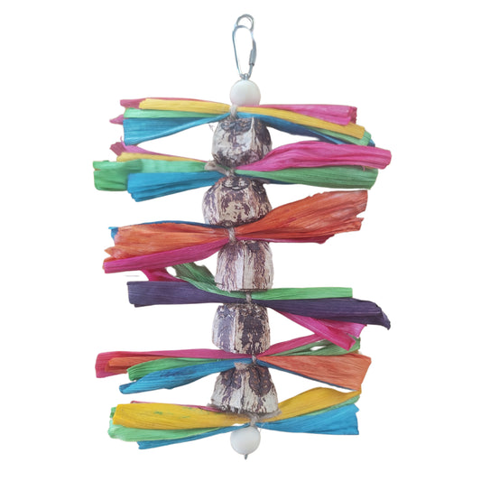 bird toy made with mahogony pods and coloured corn leafs that look like wings