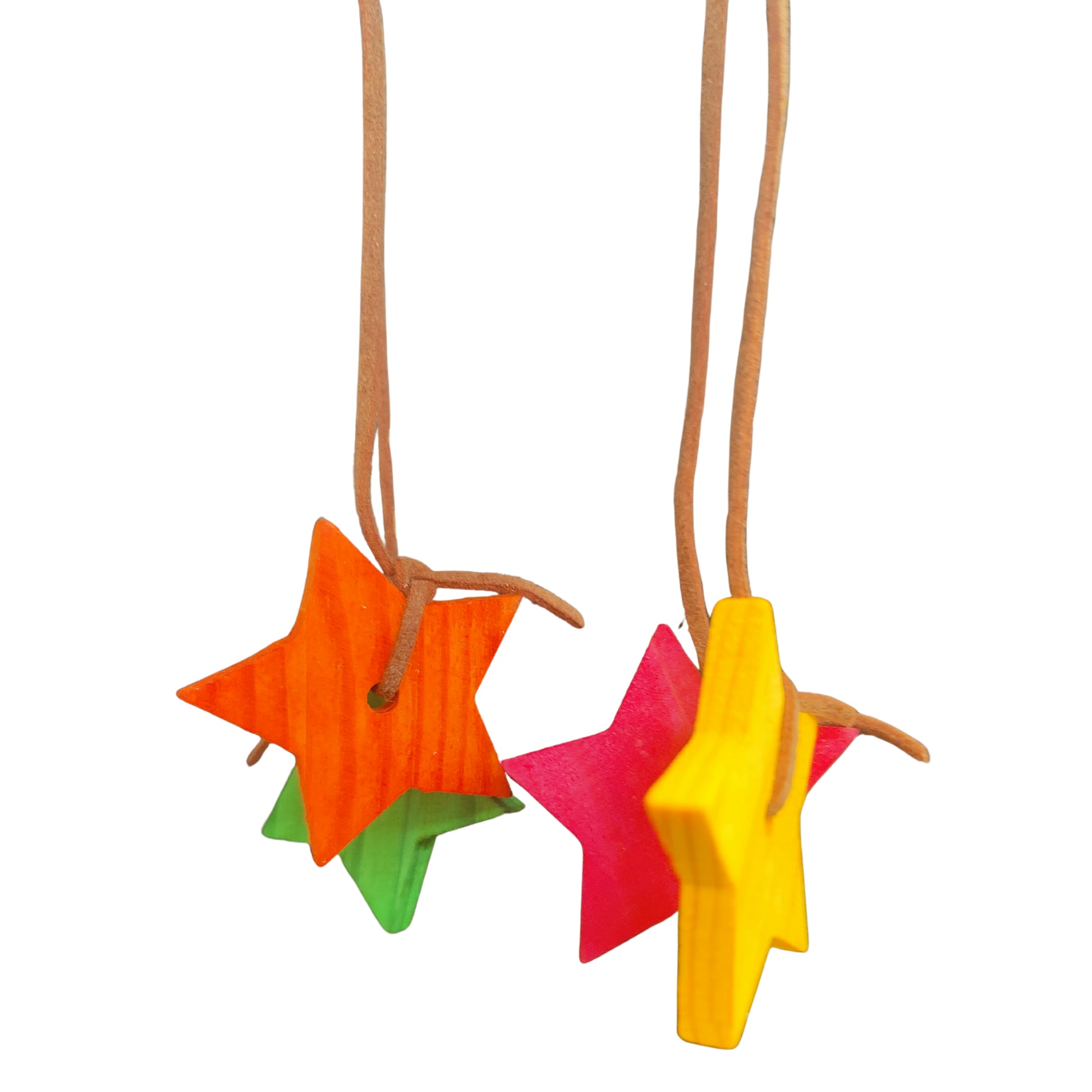 coloured wood stars close up on the mahogstar bird toy