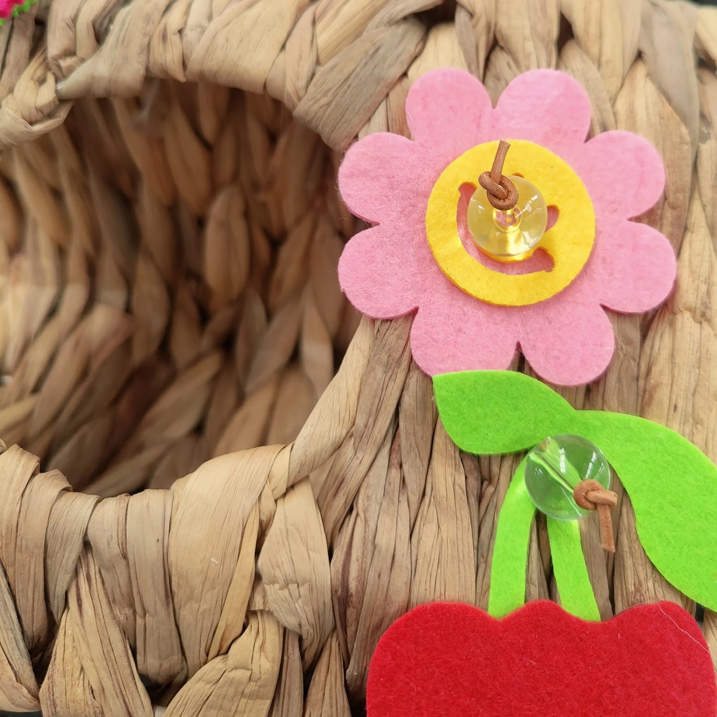 close up of the flower on the natural hidey hole bird toy