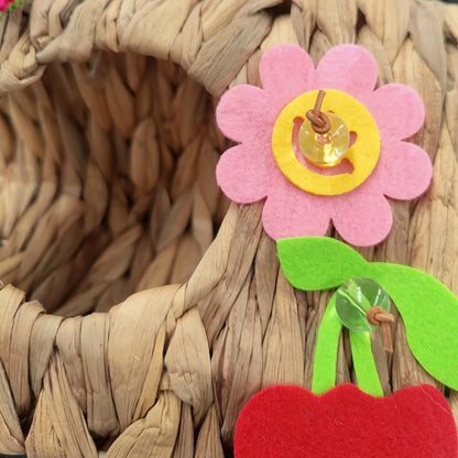 close up of the flower on the natural hidey hole bird toy