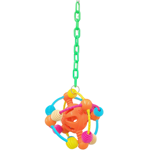 Hanging on a plastic chain is a space odyssey ball bird toy