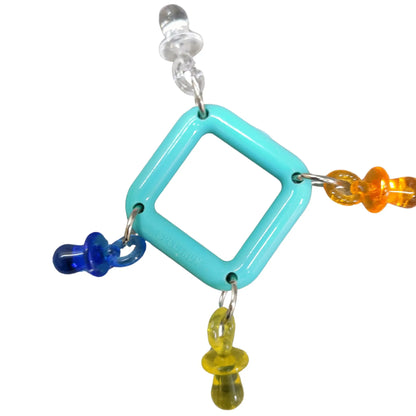 foot toy with dummies on a acrylic square