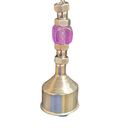 close up of the bell on the tippy bird toy
