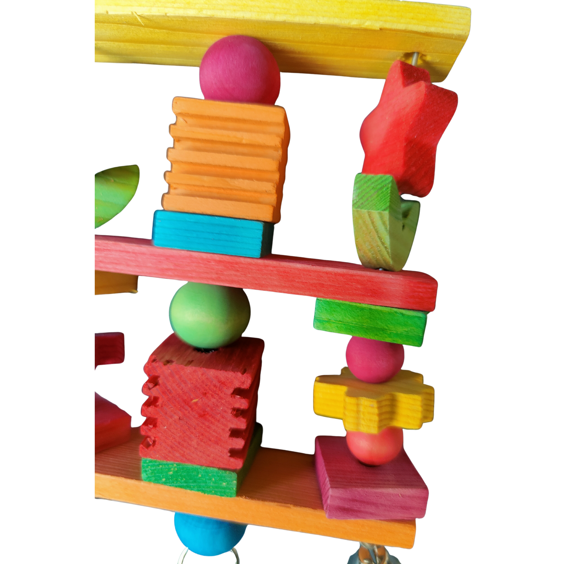 coloured wood star and leaves bird toy close up