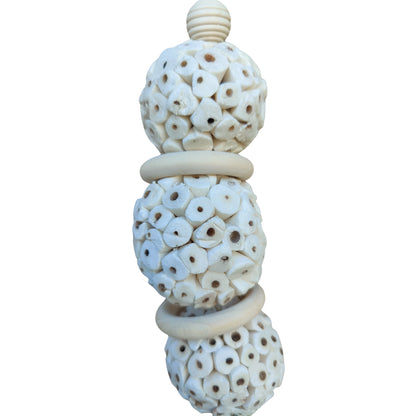 close up of the tripple sola balls bird toy
